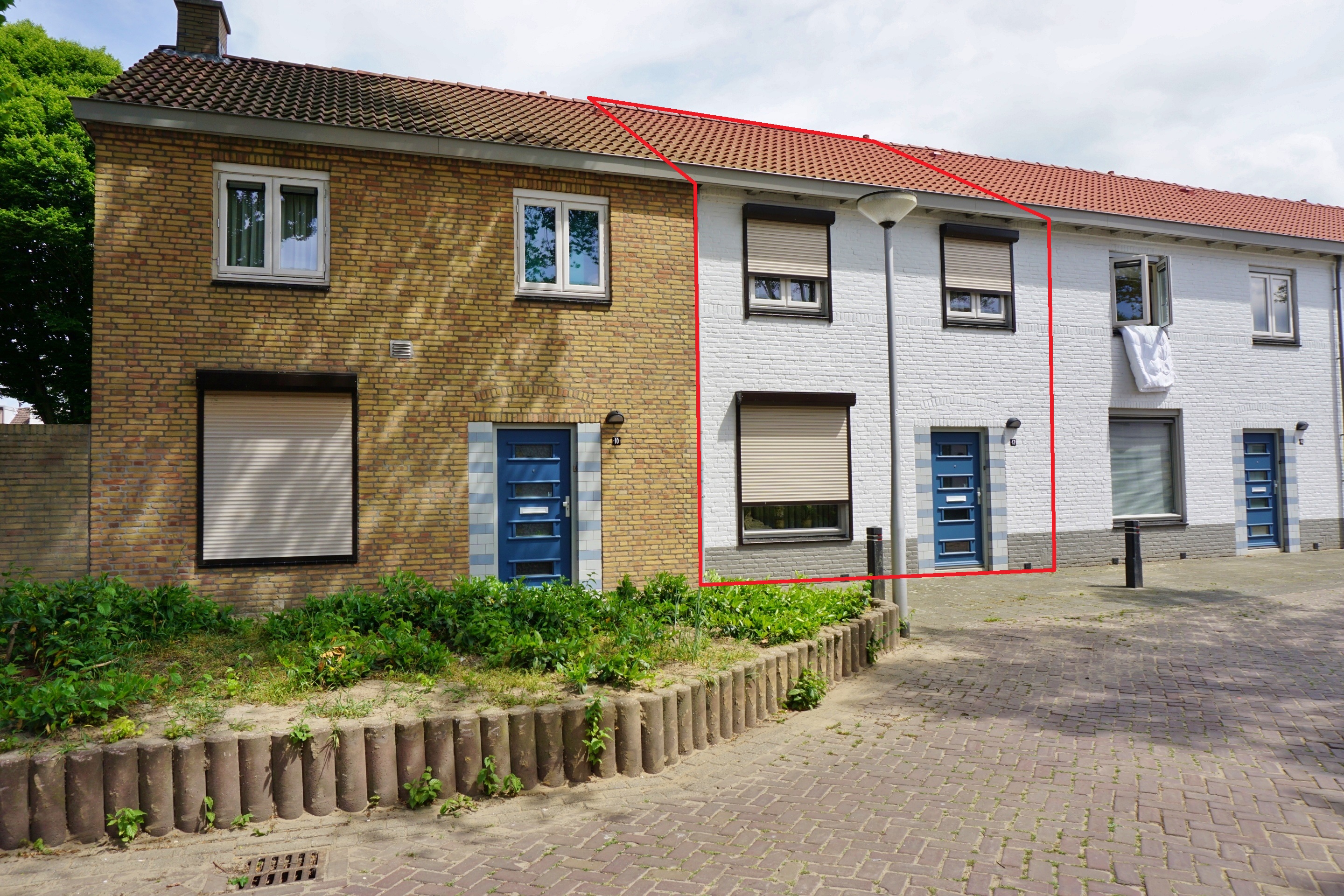 Tussenwoning te huur: Dr. P. van Hoekstraat 12, Landbouwbuurt Tilburg